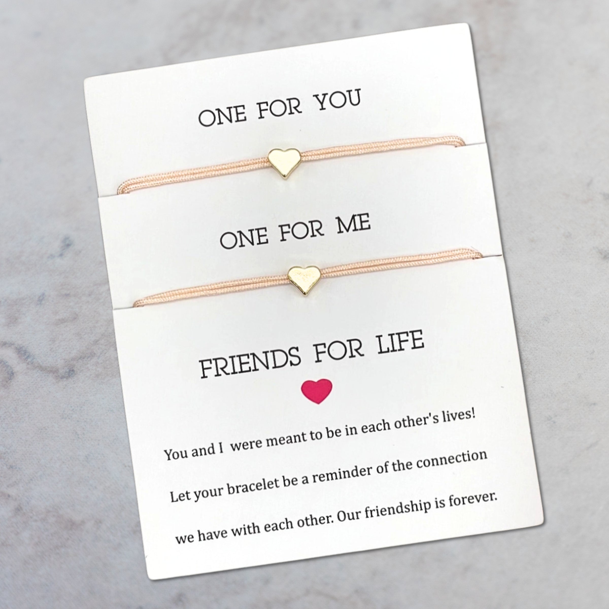 Armband_Friendsforlife_Herz_peach_gold. 2 Armbänder auf Karte gezogen. Marke: Parsley&Pepper