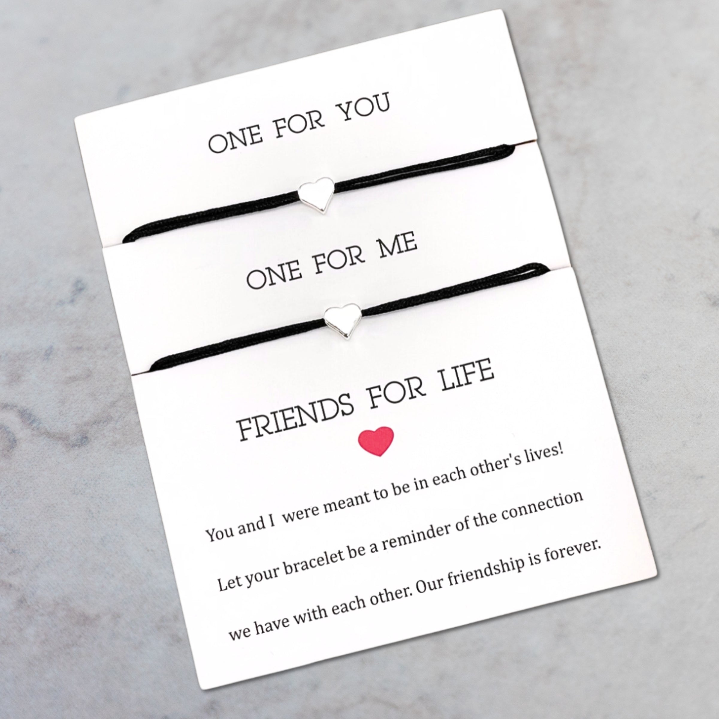 Armband_Friendsforlife_Herz_schwarz_silber. 2 Armbänder auf Karte gezogen. Marke: Parsley&Pepper